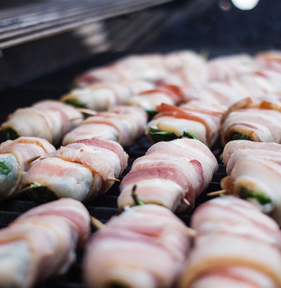 Tim Loves Brisket & Frito-Lay Queso stuffed in bacon wrapped Jalapeño Poppers